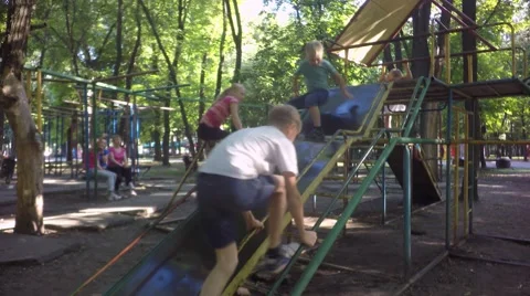Children play on the playground, Video stock 65075385