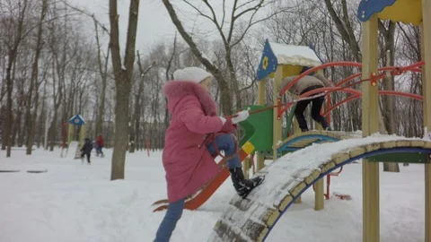 Children play on the playground. Video stock 87740723