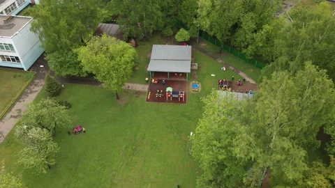 Children play on the playground in kinde... | Stock Video | Pond5