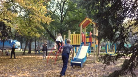 Children play on the playground, Late fall. 库存影片 68400657