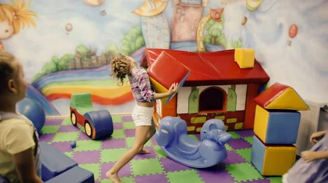 Children play in the playroom Stock Footage 64345488