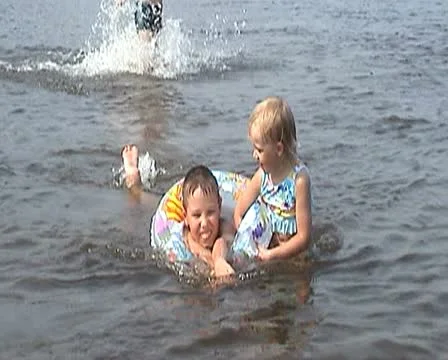 Children play in the river Video stock 11361960