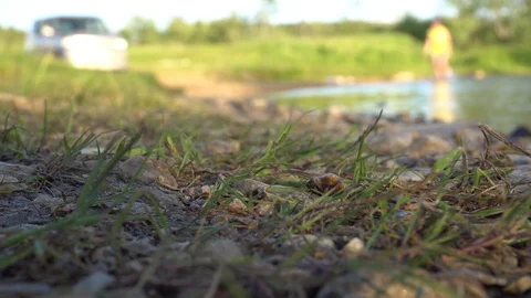 Children play by the river Video stock 111171266