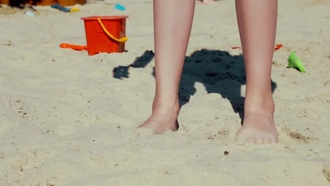 Children play in the sandbox in summer Stock Footage 77637748