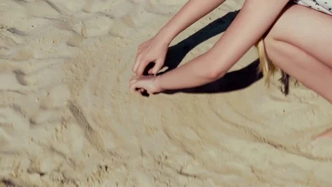 Children play in the sandbox in summer Stock Footage 77638033