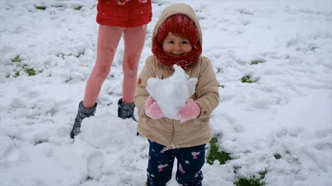 Children play in the snow. selective focus. Stock Footage 223576694