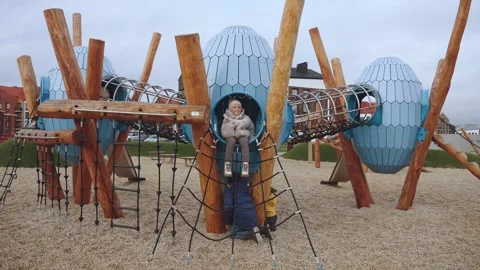 Children on the playground in the residential complex Stock Footage 323829387