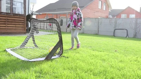 Children playing in the backyard with mother Stock Footage 143712633