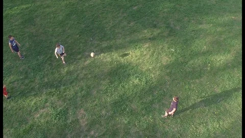 Children playing ball on the field view from above Stock Footage 75880152