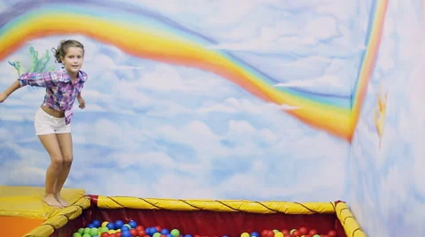 Children playing in the ball pool Video stock 64351122