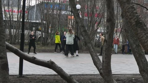 Children playing ball in the street. Stock Footage 317183473