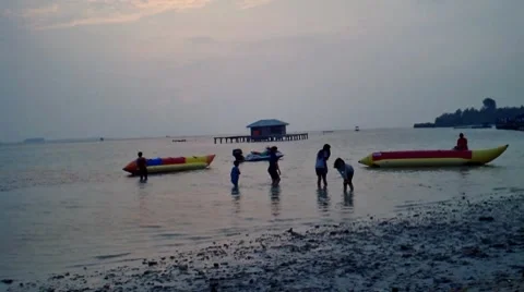 Children Playing in Beach Stock Footage 7808025
