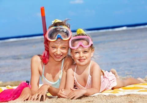Children playing on  beach. Stock-Fotos