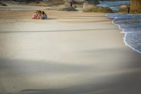 Children playing on the beach Stock Photos