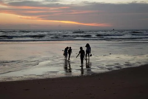 Children playing on the beach Stock Photos