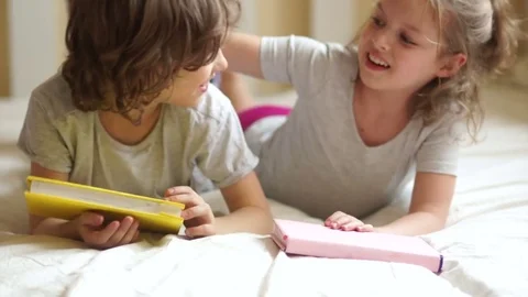 Children playing in the bedroom Stock Footage 75348992