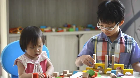 Children playing with blocks Stock Footage 52907840