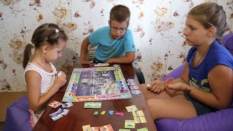 Children playing board game Stock Footage 84992628