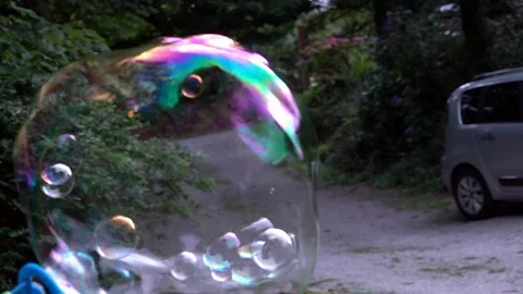 Children playing with bubbles Stock Footage 94408662