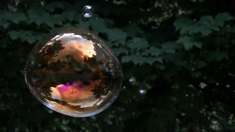 Children playing with bubbles Stock Footage 94408894