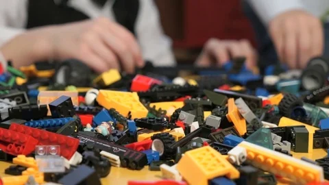 Children playing with building kit. Close-up Stock Footage 83063884
