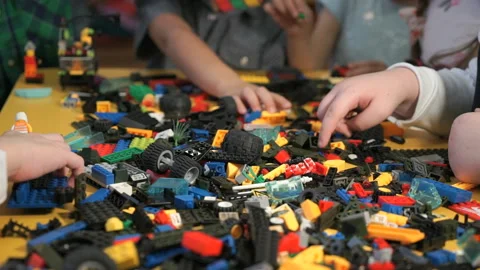 Children playing with building kit. Close-up Stock Footage 87576907