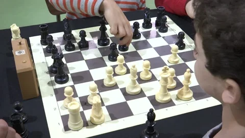 CHILDREN PLAYING CHESS Stock Footage 100185278