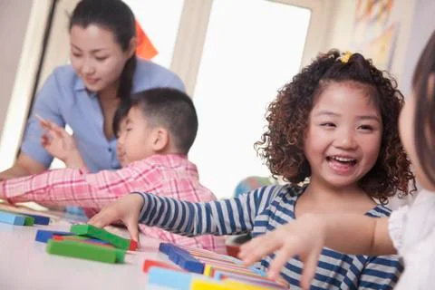 Children Playing in a Classroom Stock Photos