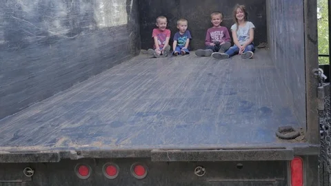 Children playing on construction equipment.  Video stock 83495520