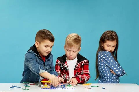 Children playing with electronic constructor at studio Stock Photos