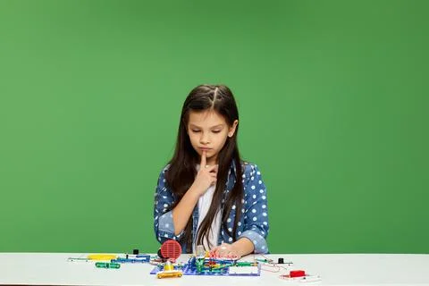 Children playing with electronic constructor at studio Stock Photos