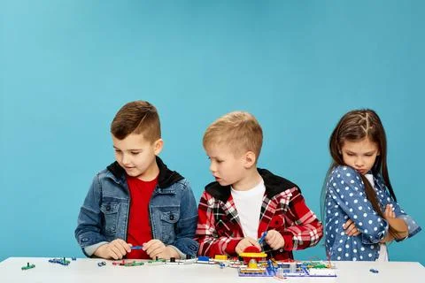 Children playing with electronic constructor at studio Stock Photos