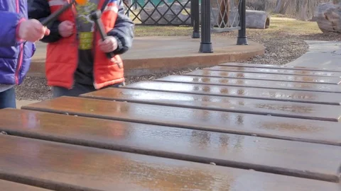 Children playing on extra large outdoor xylophone Stock Footage 71636807