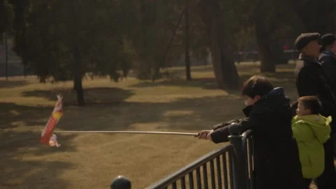 Children Playing With Fish Windsock in Park Area at Temple of Heaven, Beijing Stock Footage 345833137