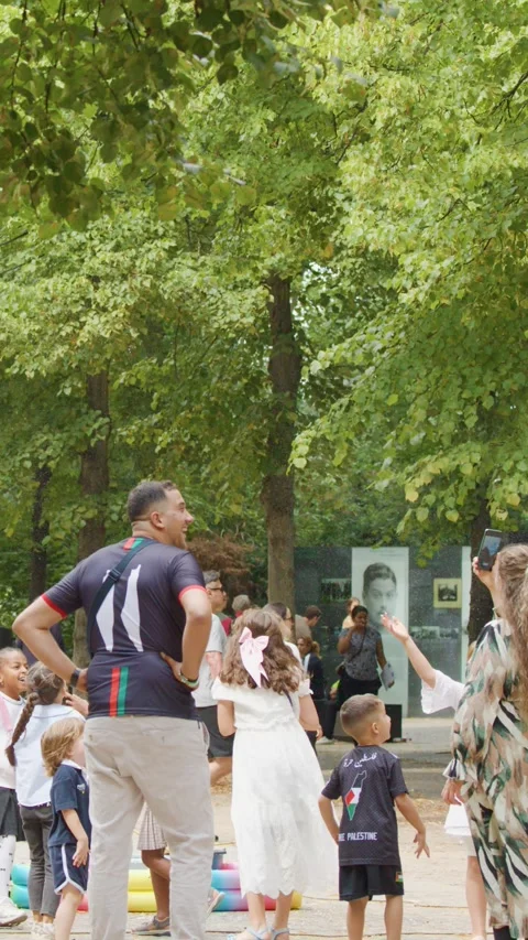 Children Playing with Giant Soap Bubbles in Berlin Park Stock Footage 315086322