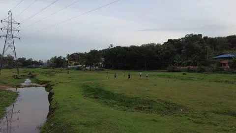 Children playing in green meadows Stock Footage 198350502