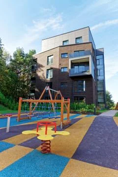 Children playing ground at Modern complex of apartment residential buildings Stock Photos