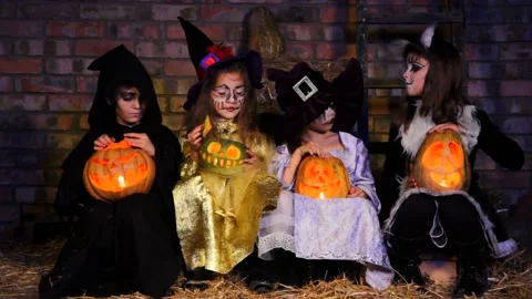 Children playing with halloween pumpkins Stock Footage 139705387
