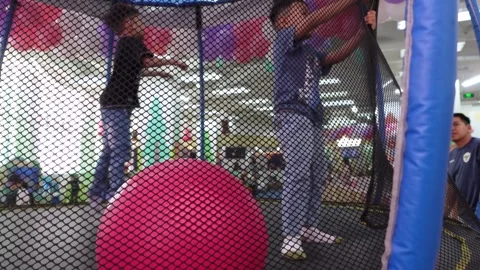 Children playing happily on the trampoline Stock Footage 314270071