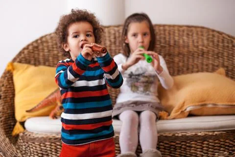 Children playing on instruments Stock Photos