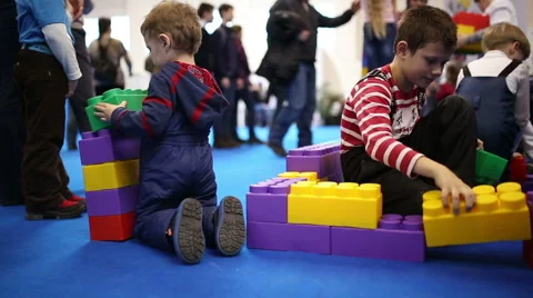 Children playing with Lego Stock Footage 63789084