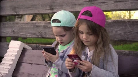 Children playing mobile games Stock Footage 130467284