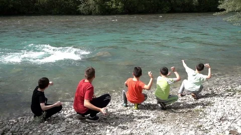 Children Playing Near The River Stock Footage 82177446