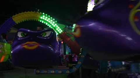 Children playing in night amusement park Video stock 238775615