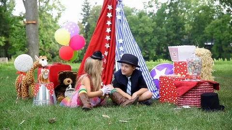 Children Playing Outside with Party Tent Stock Footage