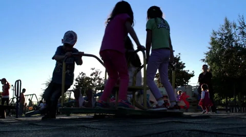 Children Playing In The Park With Roundabout at the sunset time 2 動画素材 50647750