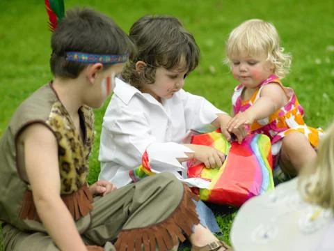 Children playing pass the parcel Stock Photos