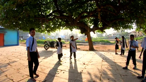 Children playing in playground Stock Footage