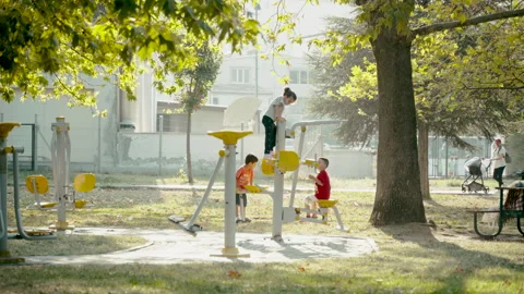 Children playing in the playground Stock Footage 250400703