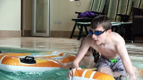 Children playing in pool Stock-Footage 91893391